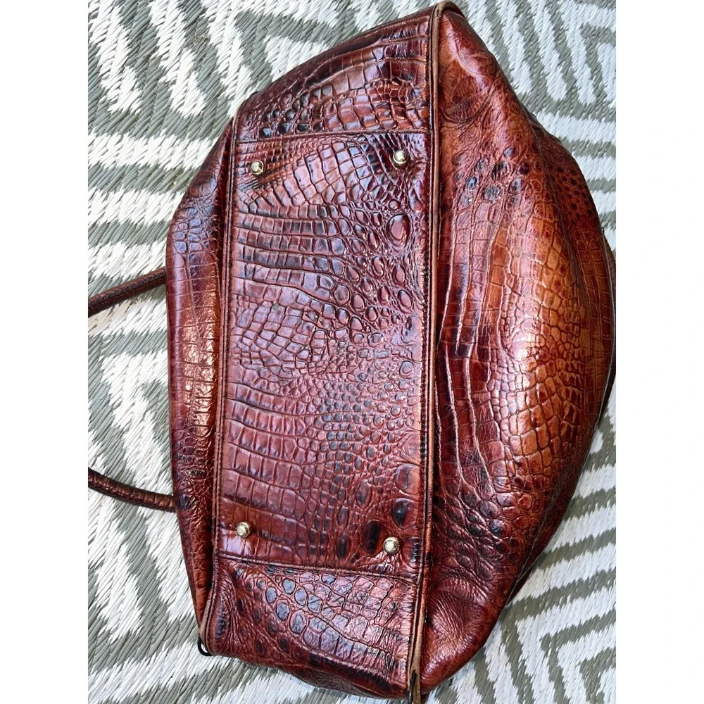brown Brahmin bucket bag features croc-embossed leather
